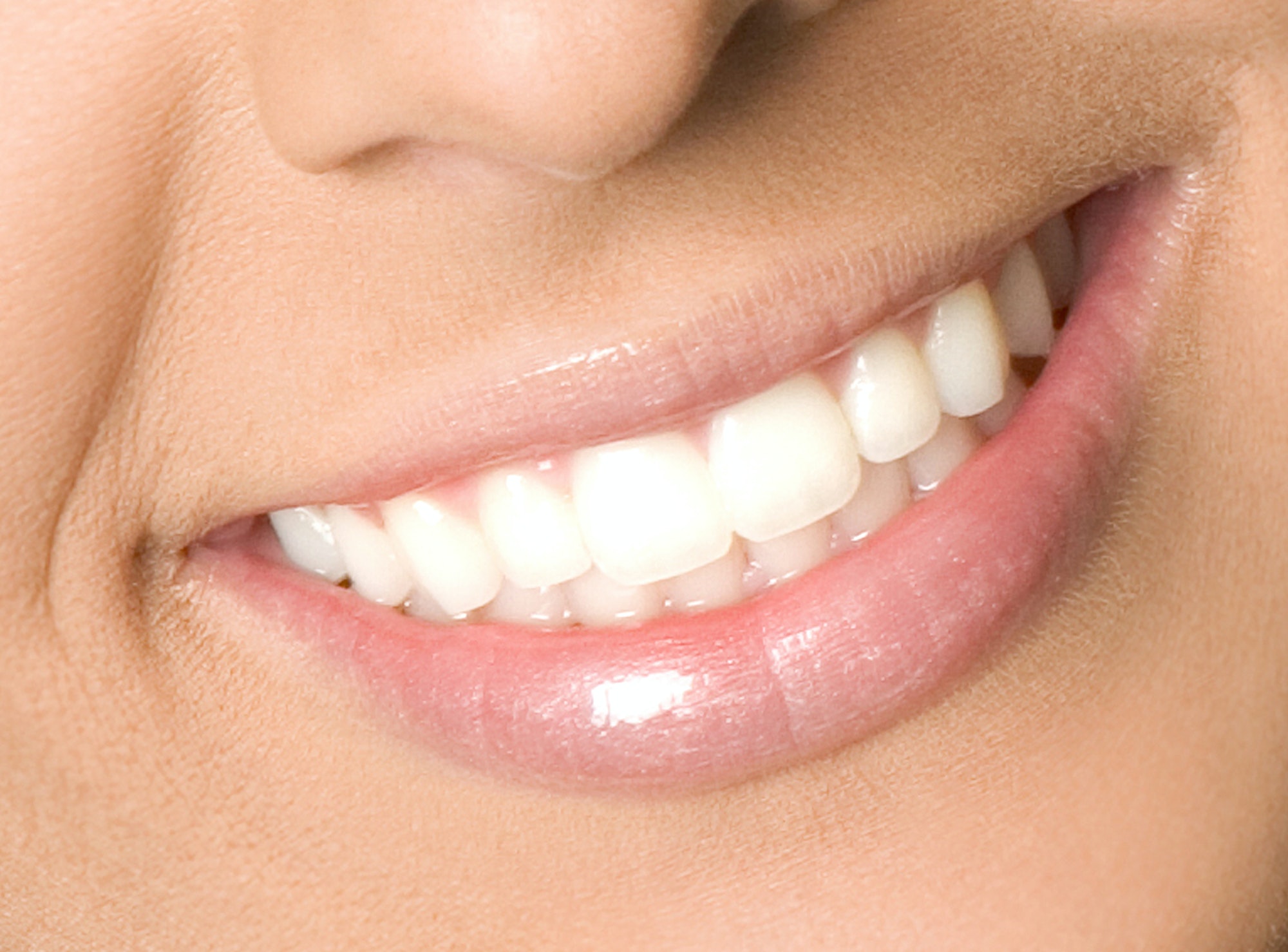 Healthy woman teeth and smile close up